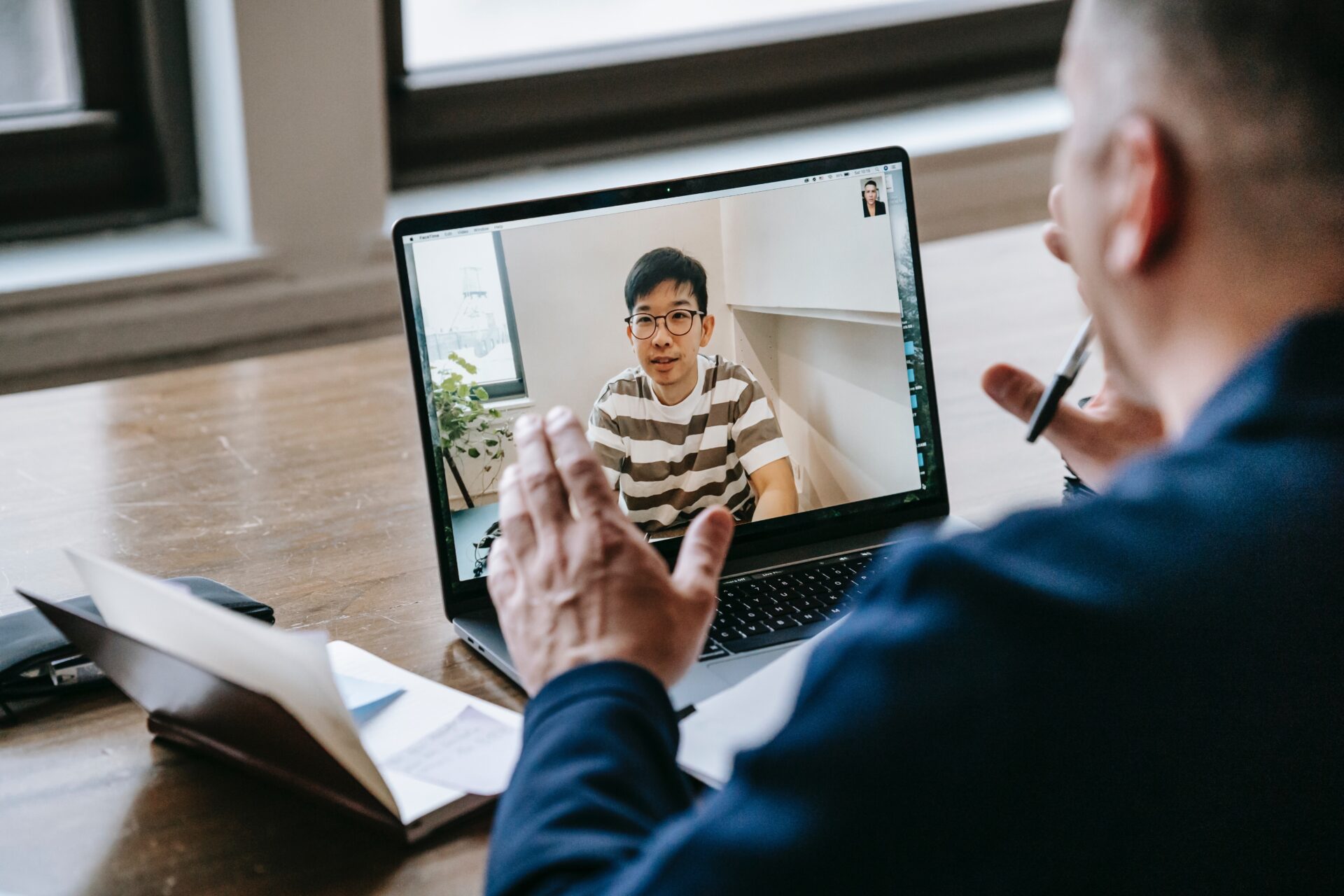 Man in virtual meeting